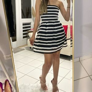 The classic little black and white dress, size XS, Brand: Reyna.